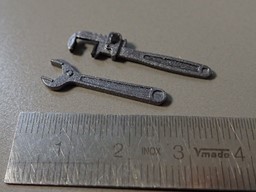 Zeige Details für große Rohrzange und verstellbarer Schraubenschlüssel Bild von große Rohrzange und verstellbarer Schraubenschlüssel